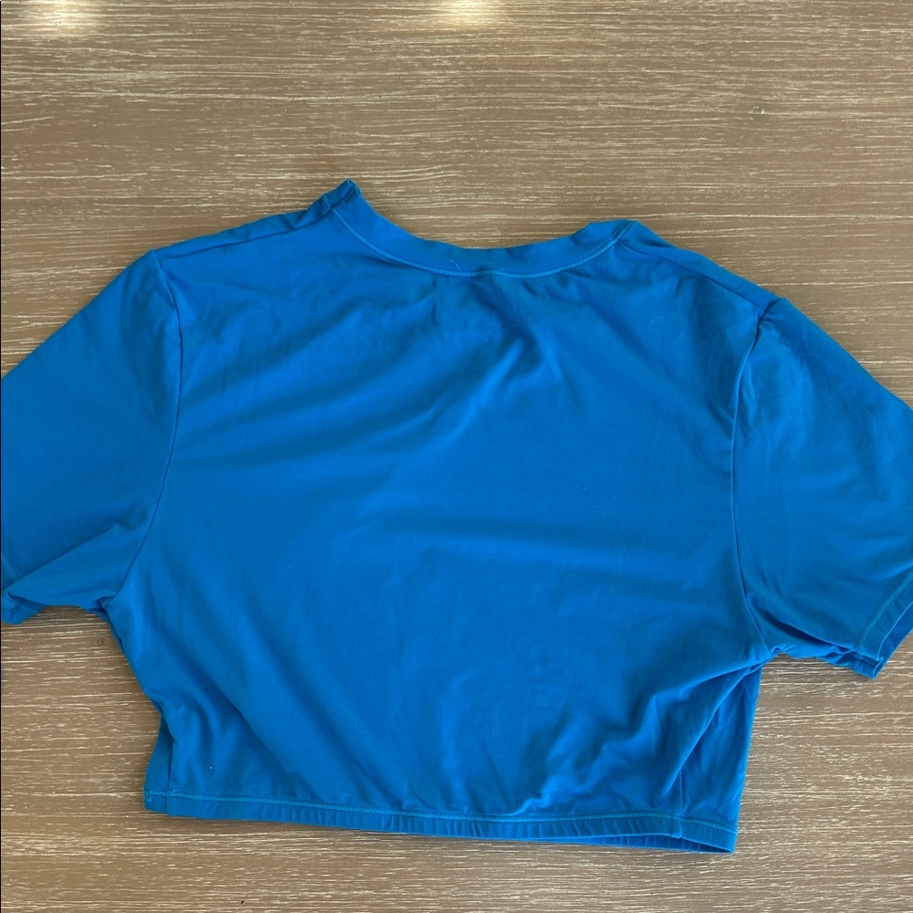 SKIMS Blue and Purple Short Sleeve cropped swim Tees - Picture 5 of 6